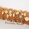 Conjunto 5 Pulseiras Pingentes Flores Escritos Banho Ouro Corrente Aço