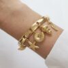 8855h Pulseira Rígida Penduricalhos Banho Ouro Fecho Encaixe (17cm)