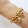 Conjunto 4 Pulseiras Pingentes Femininos Moda e Viagem Banho Ouro